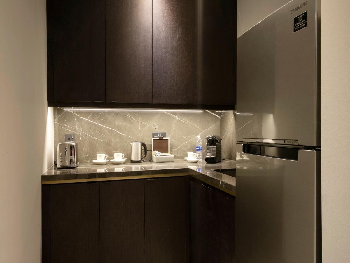 Hyatt Regency Al Kout Mall Kuwait City Exterior photo A kitchen in a hotel room