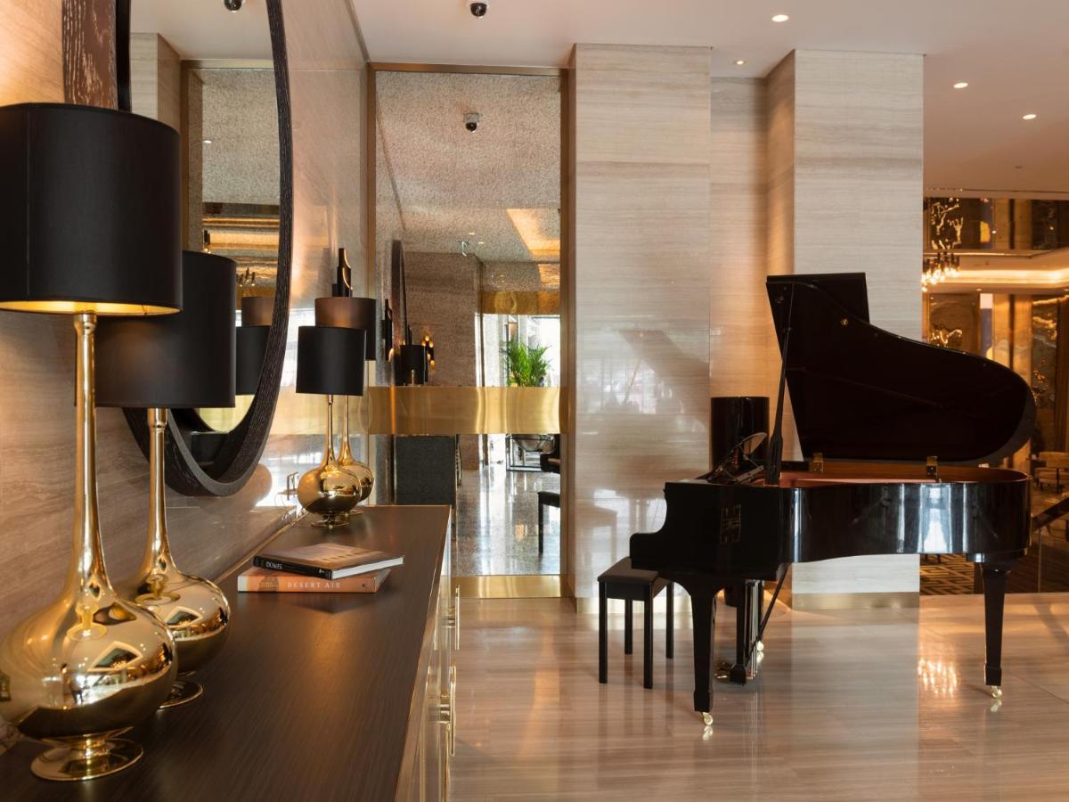 Hyatt Regency Al Kout Mall Kuwait City Exterior photo The piano room